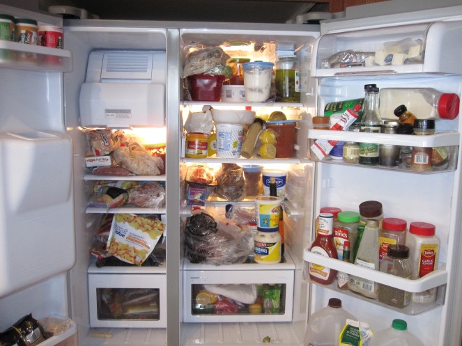 Cluttered unorganized fridge